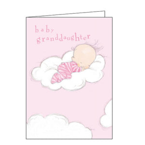 A baby girl in a pink sleepsuit sleeps soundly on a fluffy white cloud on the front of this new baby card. Pink lettering besides her reads "baby granddaughter".
