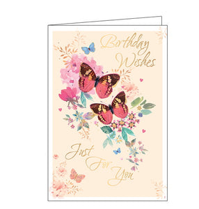 This lovely Birthday card is decorated with butterflies flitting among pink flowers. The text on the front of the card reads "Birthday Wishes Just For You".