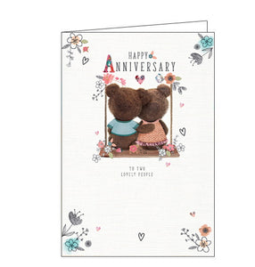 This cute Anniversary card for a special couple features two teddy bears sat together on a swing with their arms around each other. The text on the front of the card read's "Happy Anniversary to two special people".