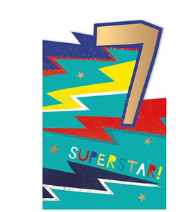 This 7th birthday card is decorated with blue, red and yellow toned stars and lightning bolts. The text on the front of the card reads "Superstar! 7". 
