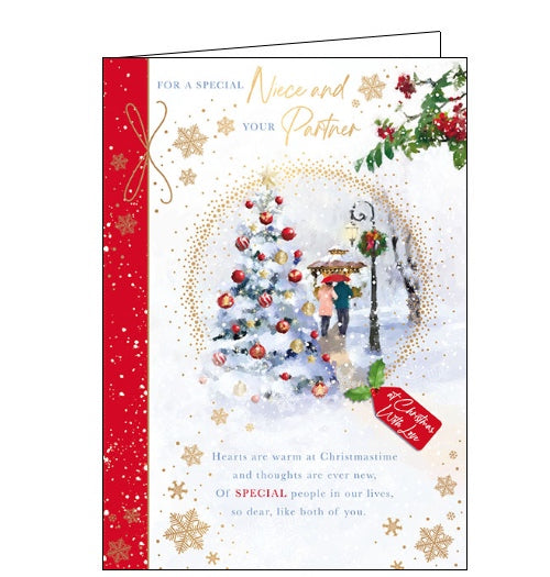 This christmas card for a special niece and her partner is decorated with a scene of a couple walking together in the snow. The text on the front of the card reads 