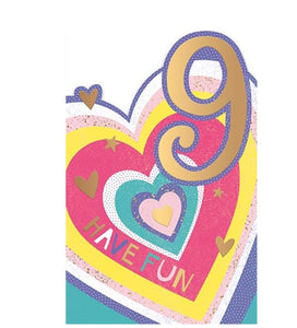 This 9th birthday card is decorated with concentric hearts in gold, pink, purple and yellow. The text on the front of the card reads "9 have fun"