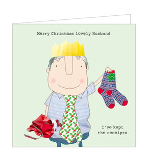 This Christmas card features one of Rosie Made a Thing's unmistakably witty and charming illustrations showing a wearing a paper party hat and a very festive tie holding out a pair of socks. The caption on the front of the card reads "Merry Christmas lovely Husband...I've kept the receipts".